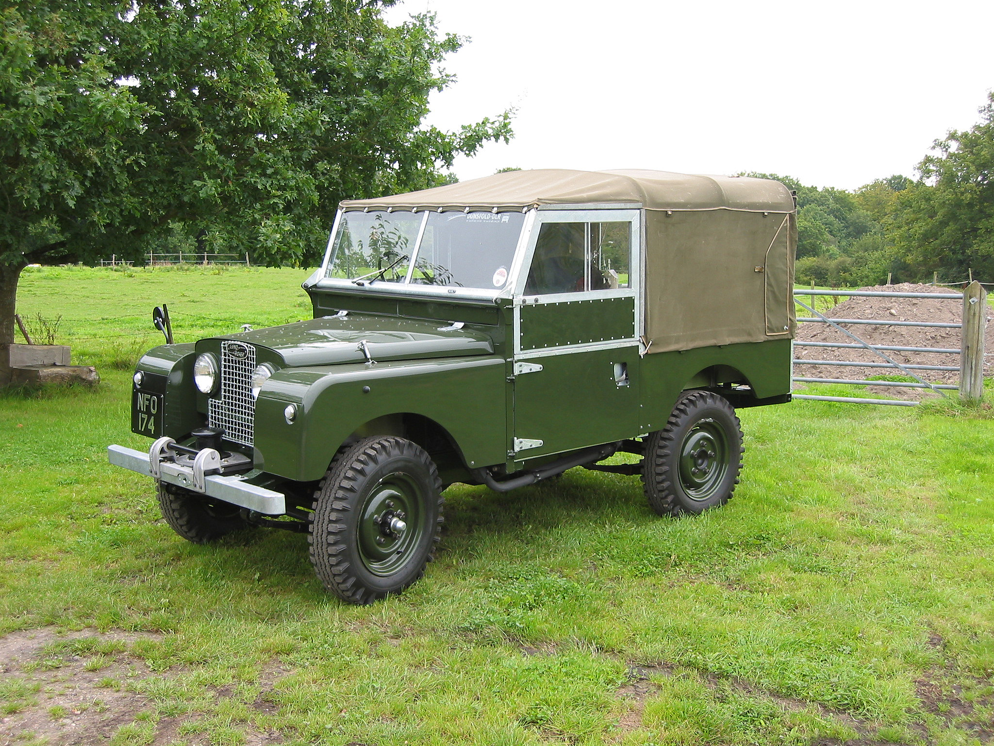 green convertible land rover