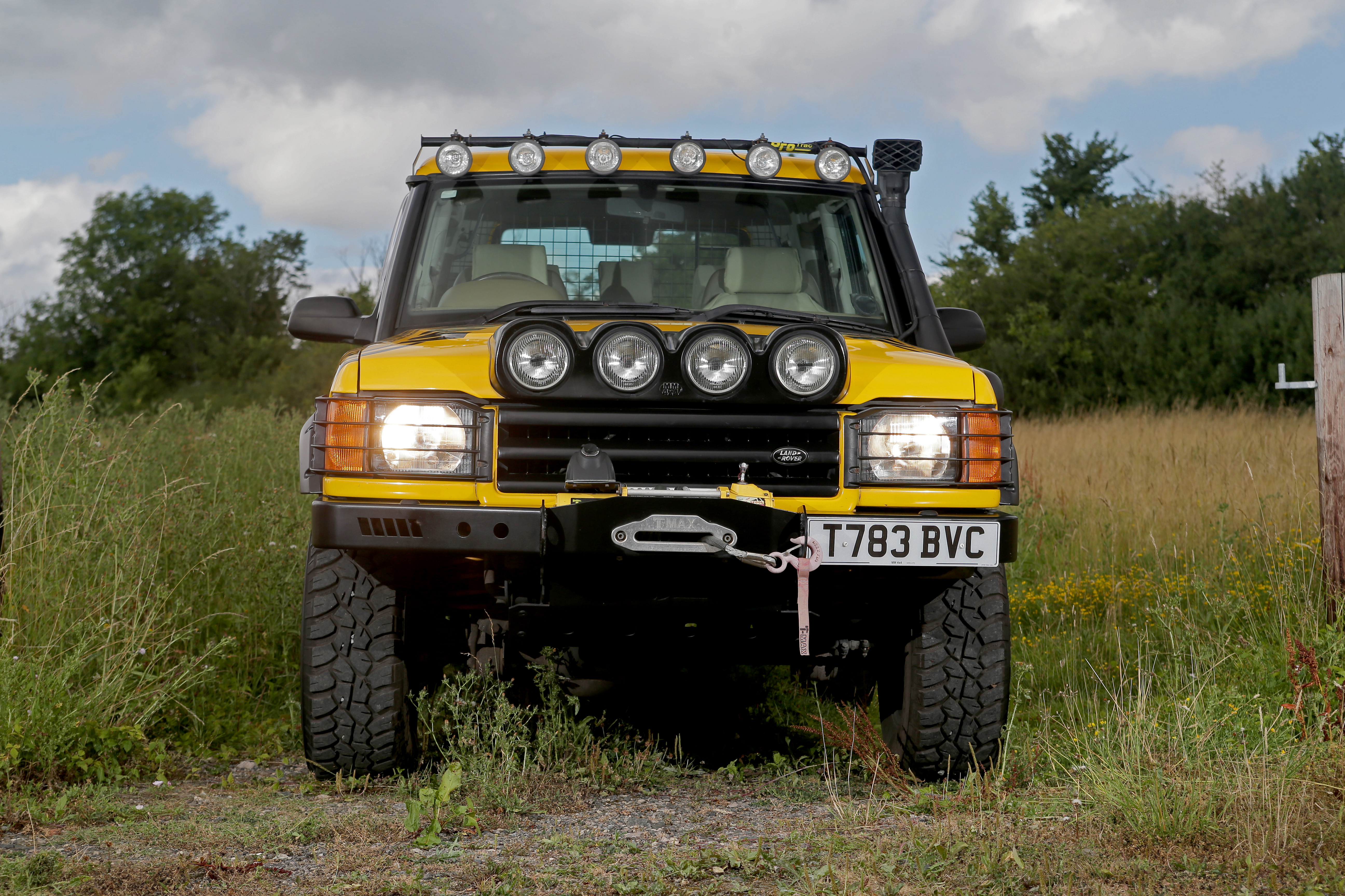 yellow land rover