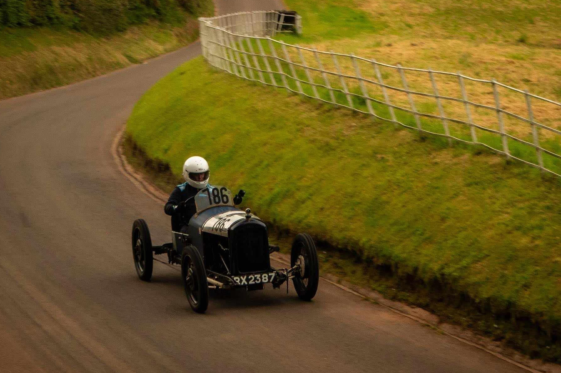 Millie racing a classic car