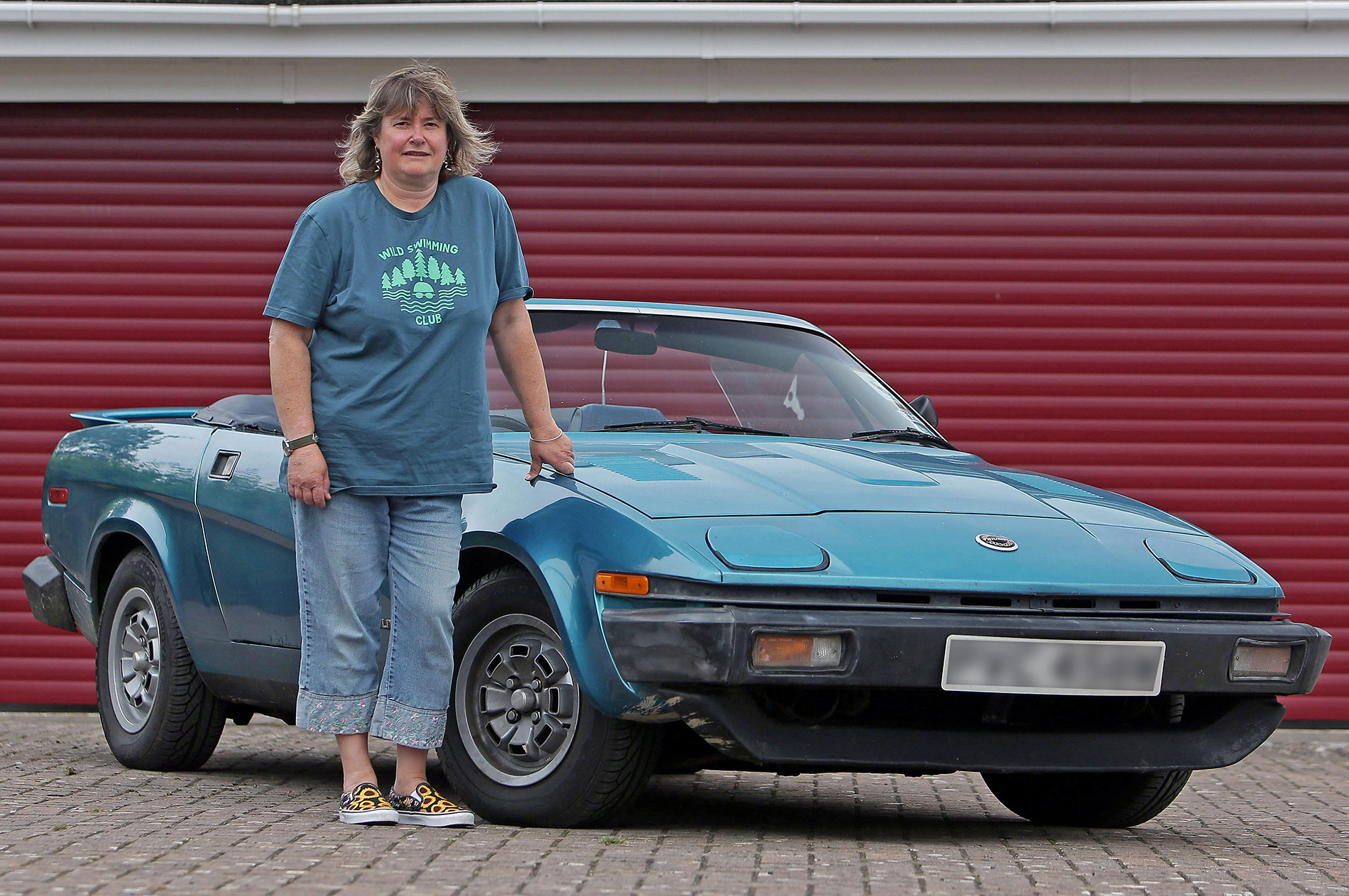 Classic car collector Vicky Dredge with her Triumph TR7