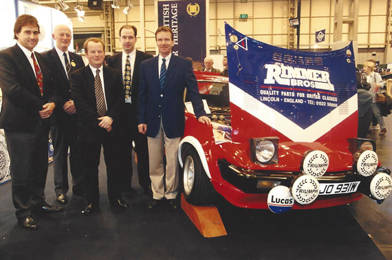 Tony Pond and Rimmer Bros Staff at NEC Show with TR7 V8