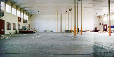 Main storage area before mezzanine and racking installation in 1990