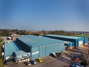 The existing warehouse in foreground and new extension