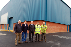 The new warehouse being handed over to Graham & Bill Rimmer by John Hallam Associates and Builders Ric Buble and Lee Smith